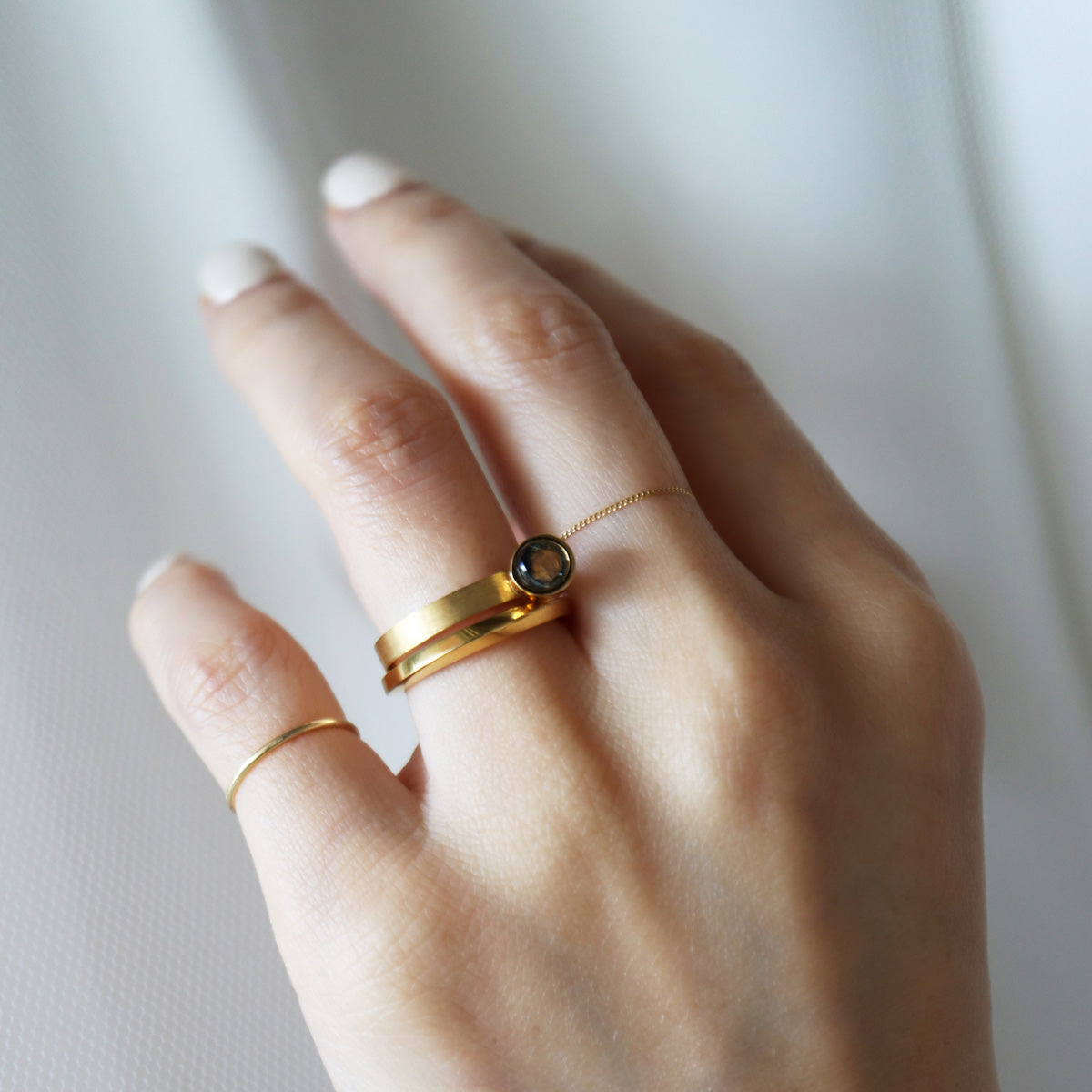 Protrude (K18) / Ring <br> Bicolor sapphire